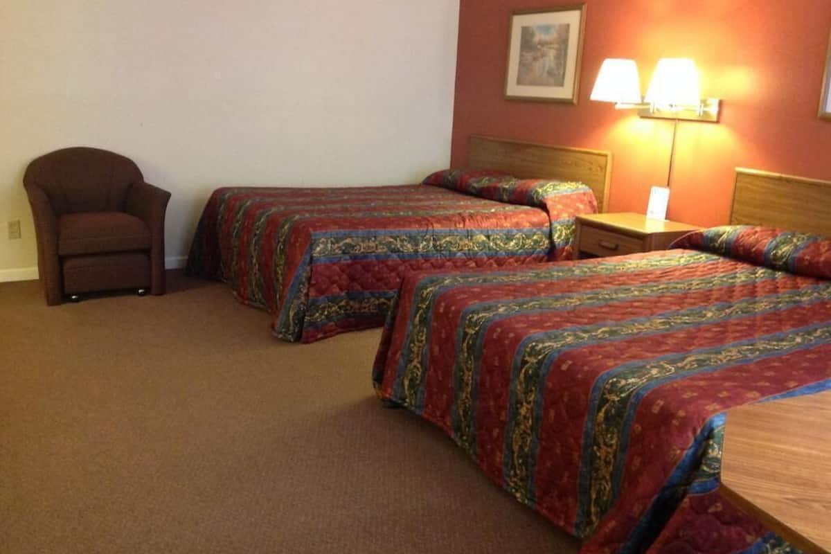 Desk, alarm clocks, bed sheets
