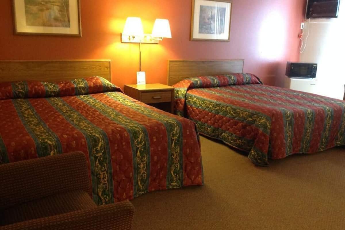 Desk, alarm clocks, bed sheets