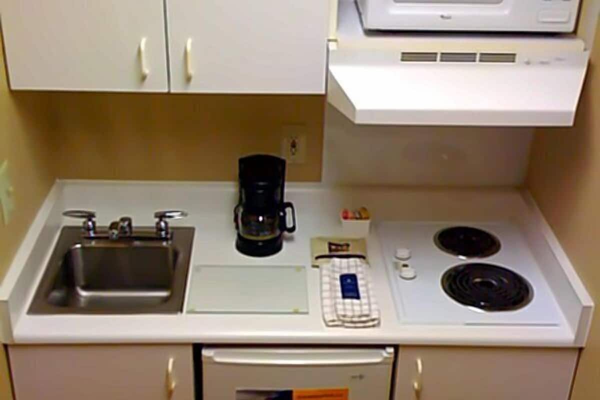 Fridge, microwave, stovetop, coffee/tea maker