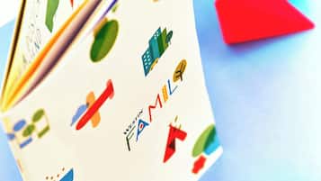 A book with colorful illustrations and the text "WESTIN FAMILY" on the cover.