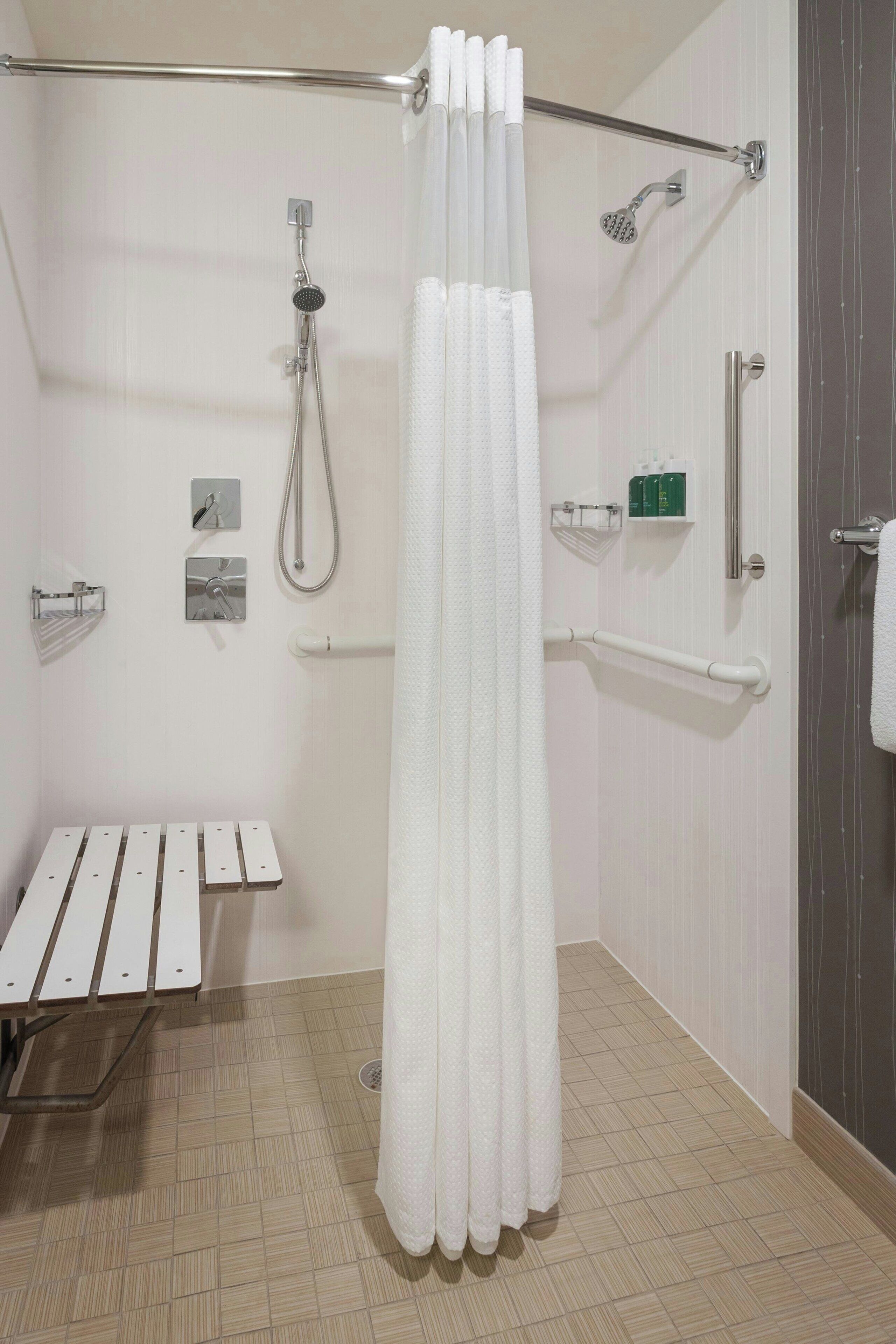 combined shower/bathtub, free toiletries, hair dryer, towels