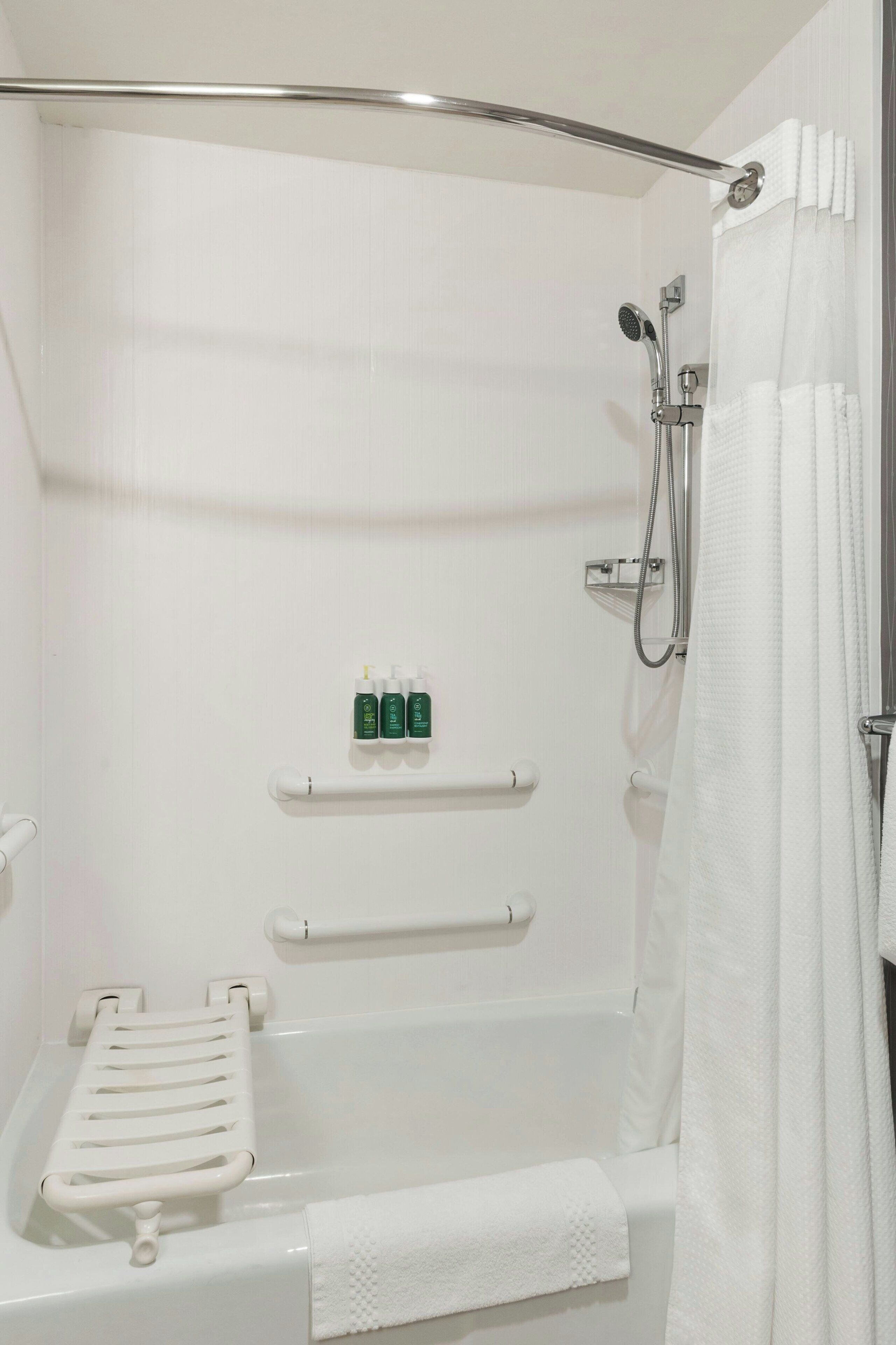 combined shower/bathtub, free toiletries, hair dryer, towels