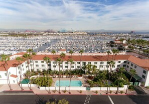 Outdoor pool, open 8:00 AM to 8:00 PM, pool loungers