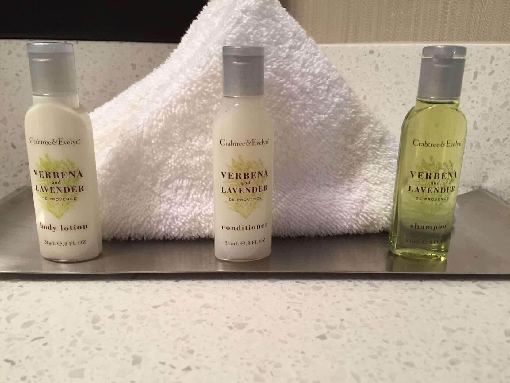 Bathroom amenities | Designer toiletries, hair dryer, towels, soap