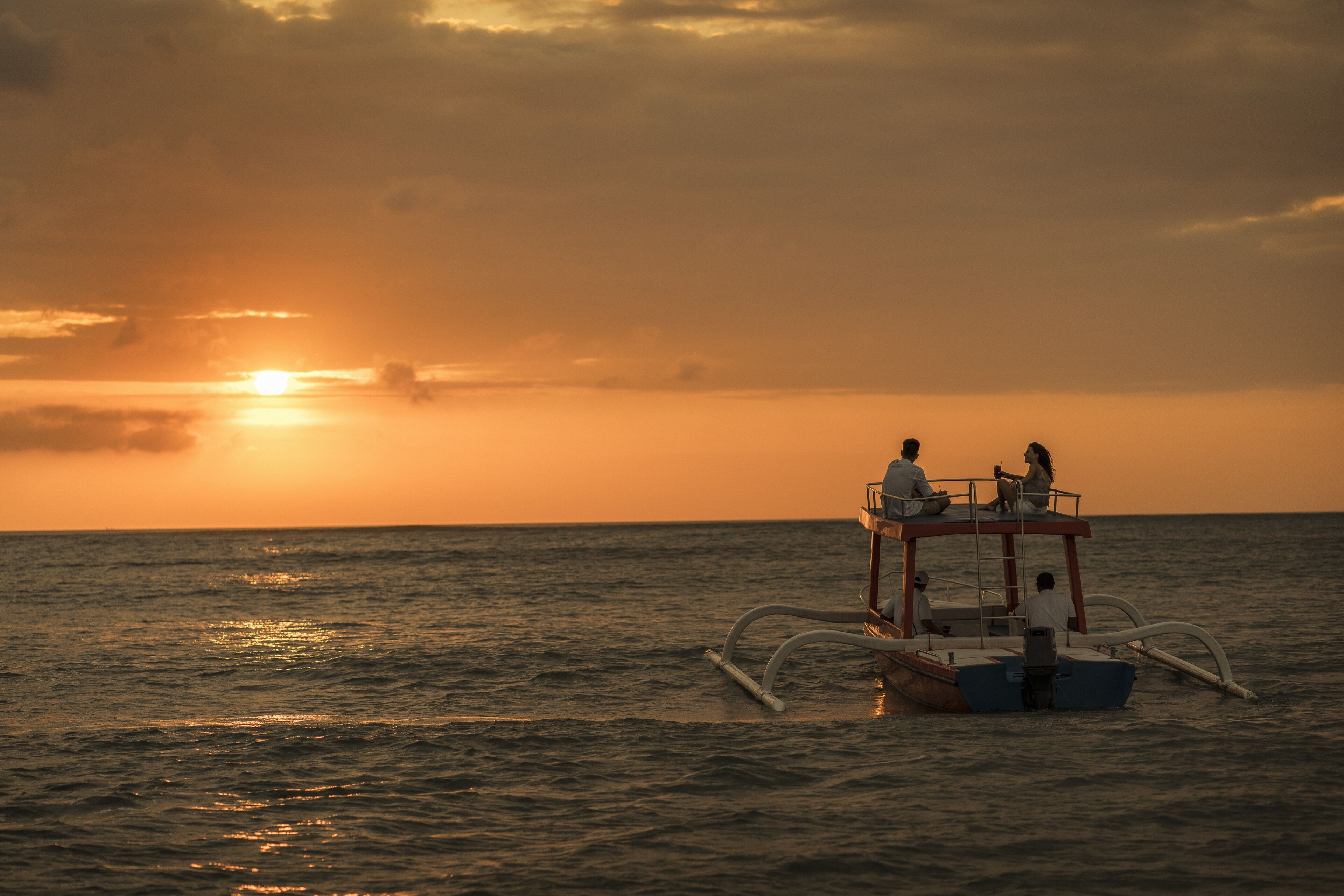 on the beach, beach cabanas, beach towels, windsurfing