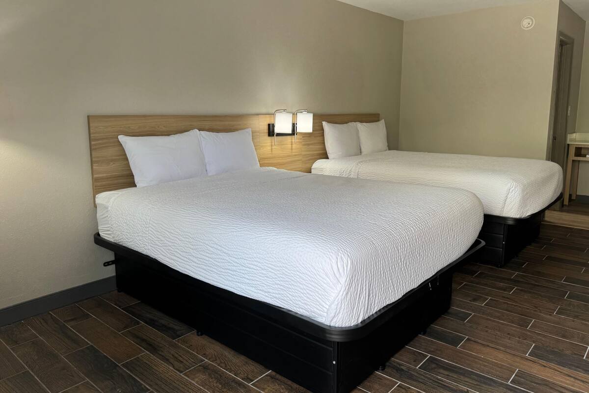 Deluxe Room, 2 Queen Beds, Non Smoking | Desk, blackout drapes, WiFi (free), bed sheets