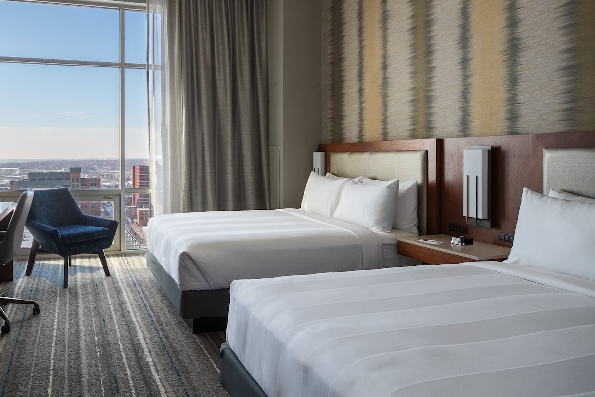 Premium bedding, down duvets, pillow-top beds, in-room safe
