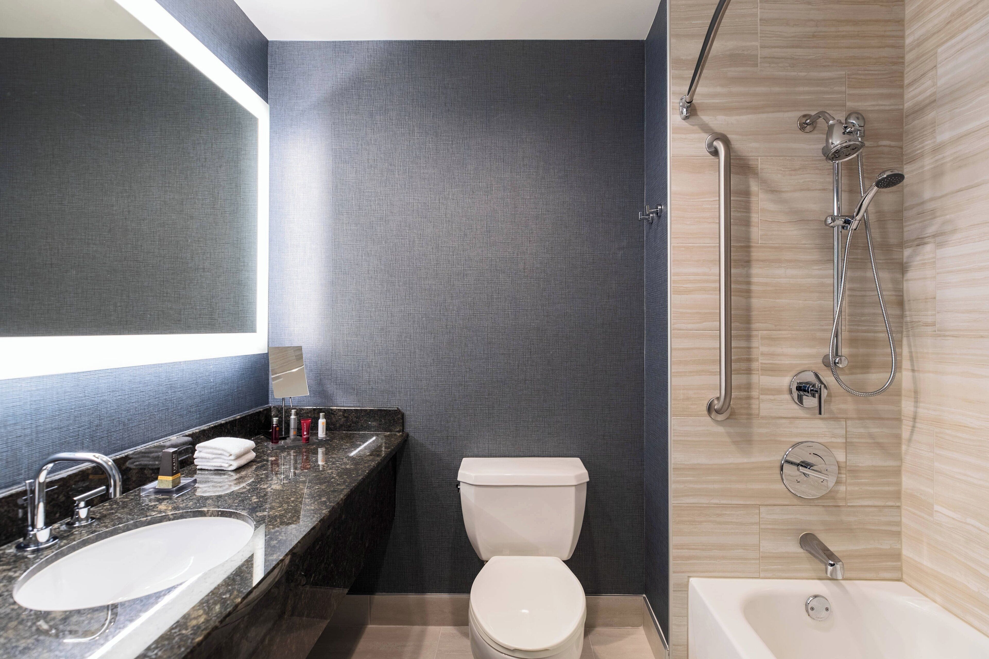 combined shower/bathtub, free toiletries, hair dryer, towels