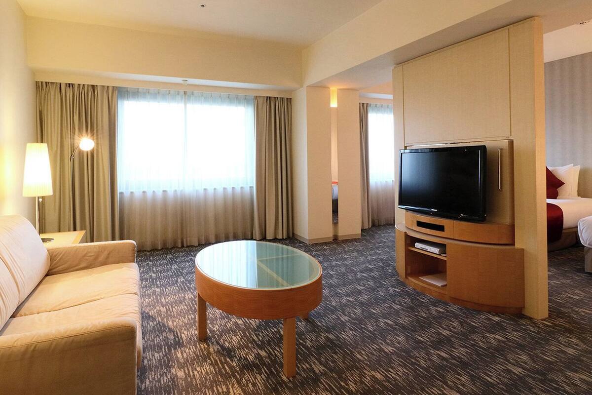 Suite Junior, 2 Tempat Tidur Double (Airport View) | 1 kamar tidur, seprai premium, selimut bulu angsa, dan brankas