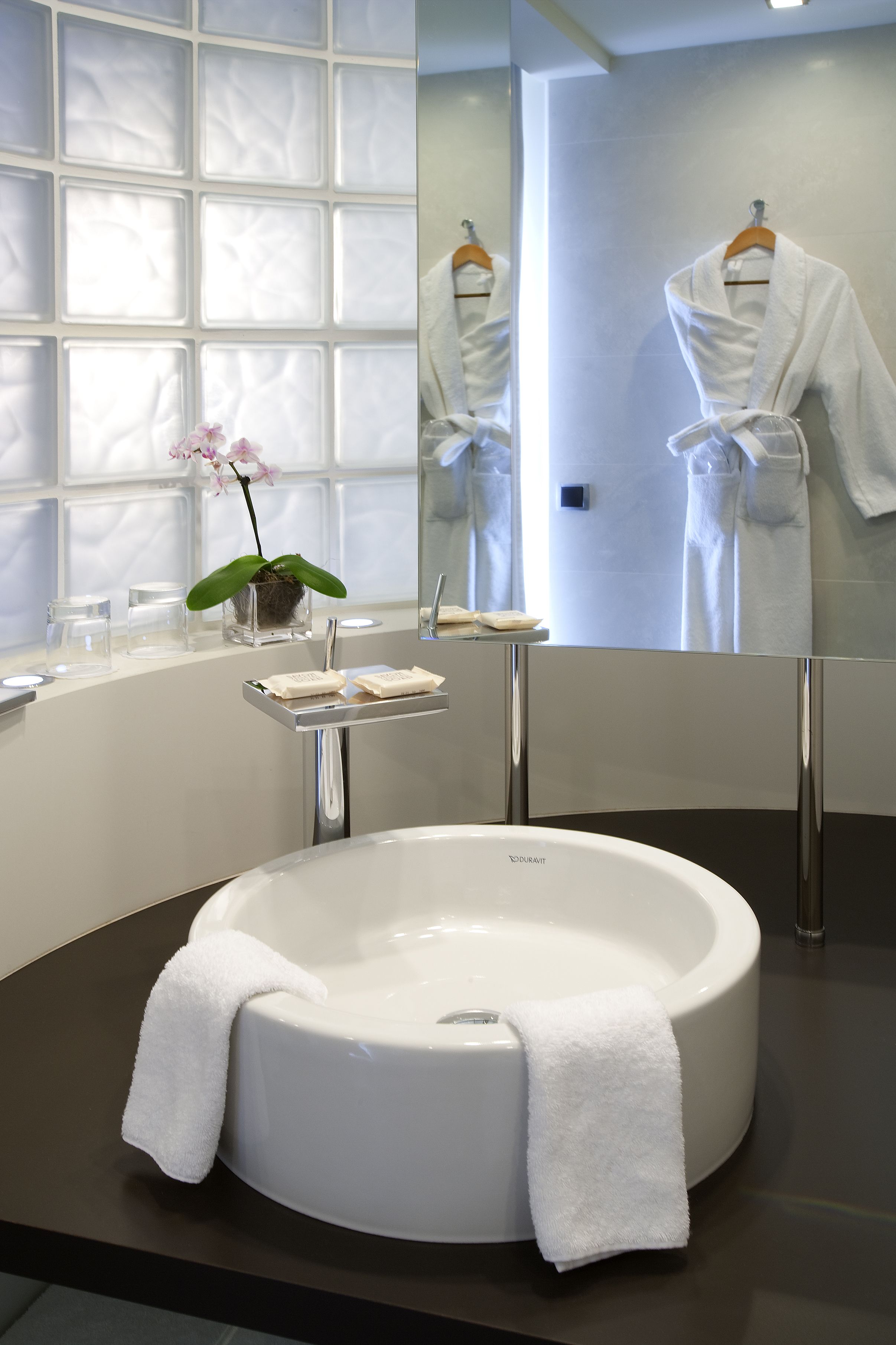 junior suite, 1 king bed, pool view | bathroom amenities | eco-friendly toiletries, hair dryer, bathrobes, slippers