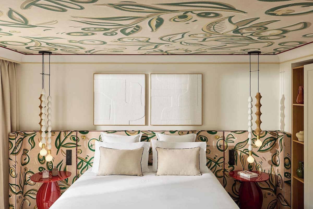 Junior Suite, Pool View | Premium bedding, minibar, in-room safe, individually decorated