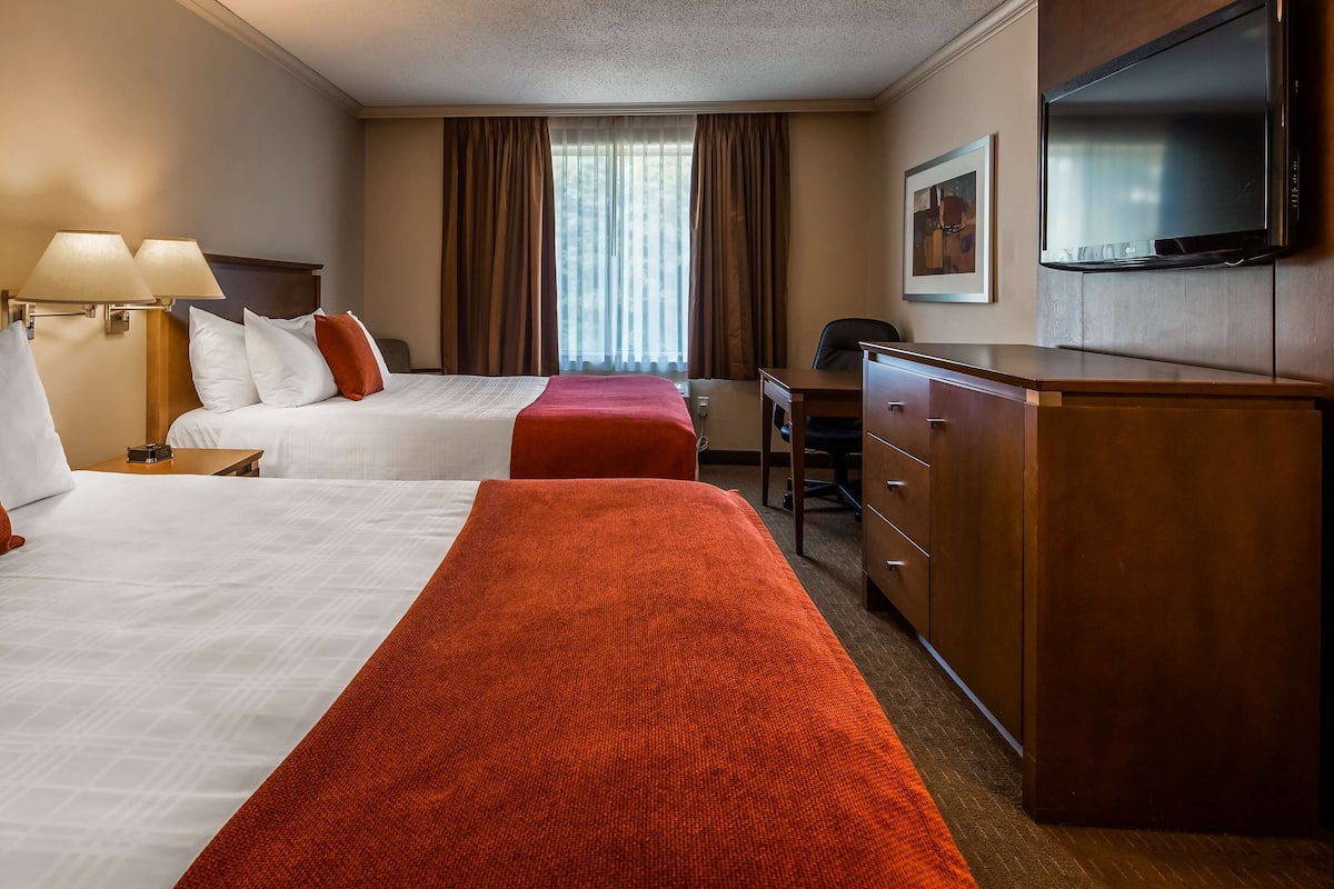 Standard Room, 2 Queen Beds, Non Smoking | Laptop workspace, blackout drapes, iron/ironing board, free WiFi