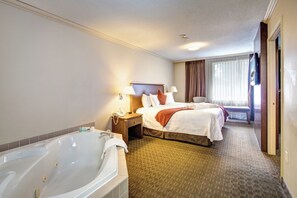 Suite, 1 King Bed, Non Smoking, Jetted Tub (with Sofabed) | Laptop workspace, blackout drapes, iron/ironing board, free WiFi - Best Western Plus Guildwood Inn (Sarnia)