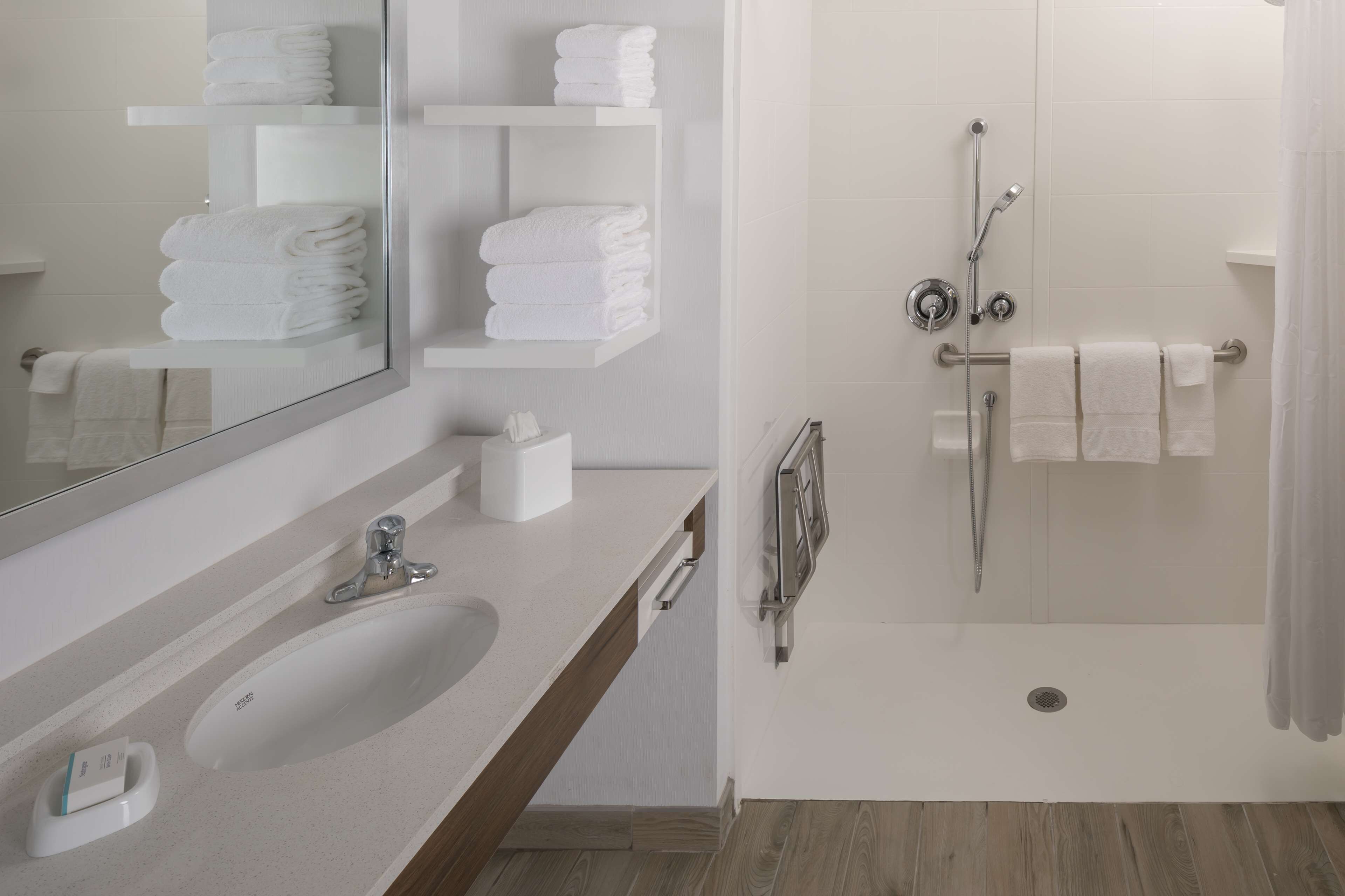 combined shower/bathtub, free toiletries, hair dryer, towels