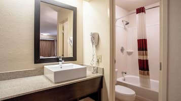 Premium Room, 1 King Bed (Upgraded Bedding & Snack, Smoke Free) | Bathroom | Combined shower/tub, free toiletries, hair dryer, towels