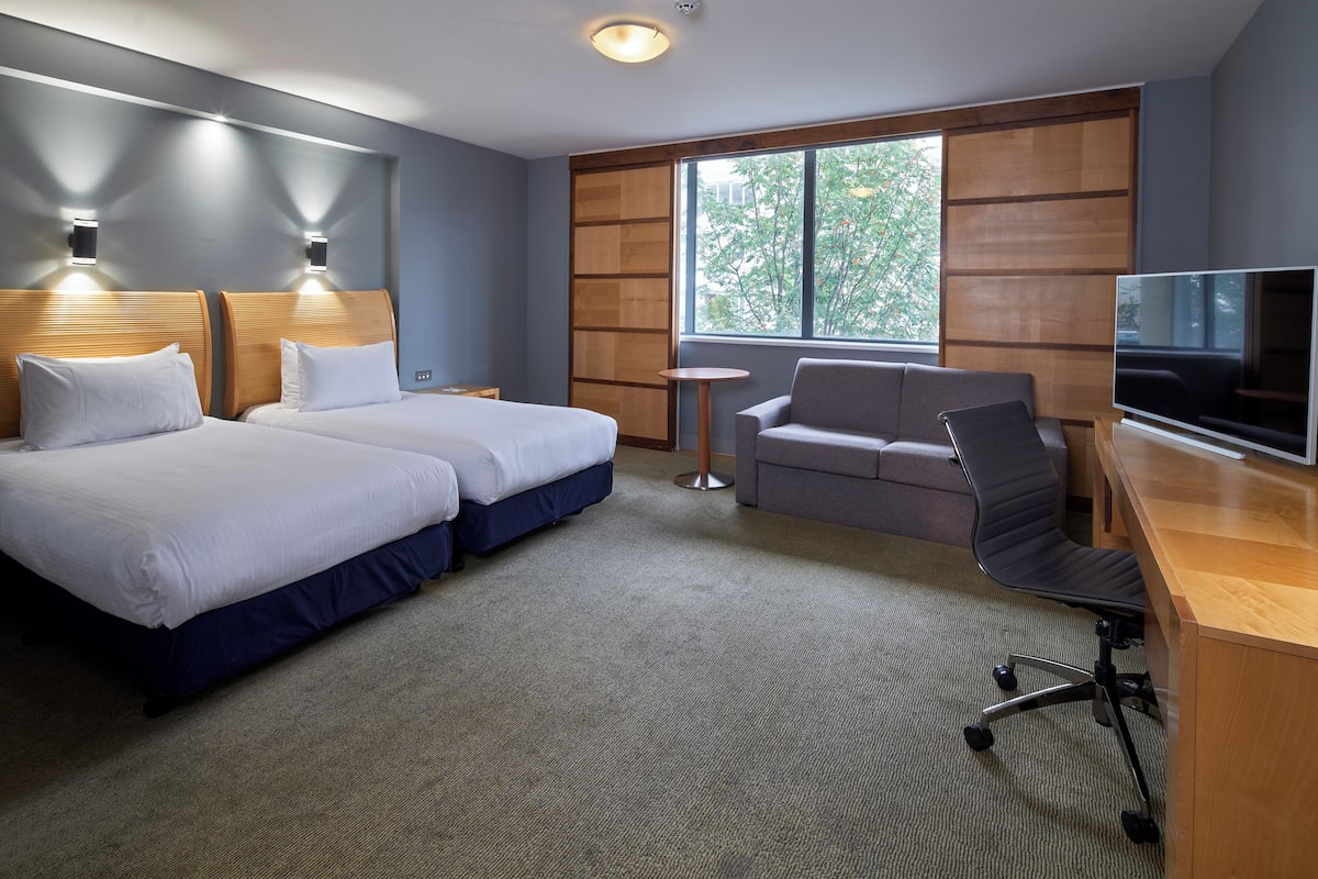 Premium Room, Multiple Beds | In-room safe, desk, laptop workspace, blackout curtains