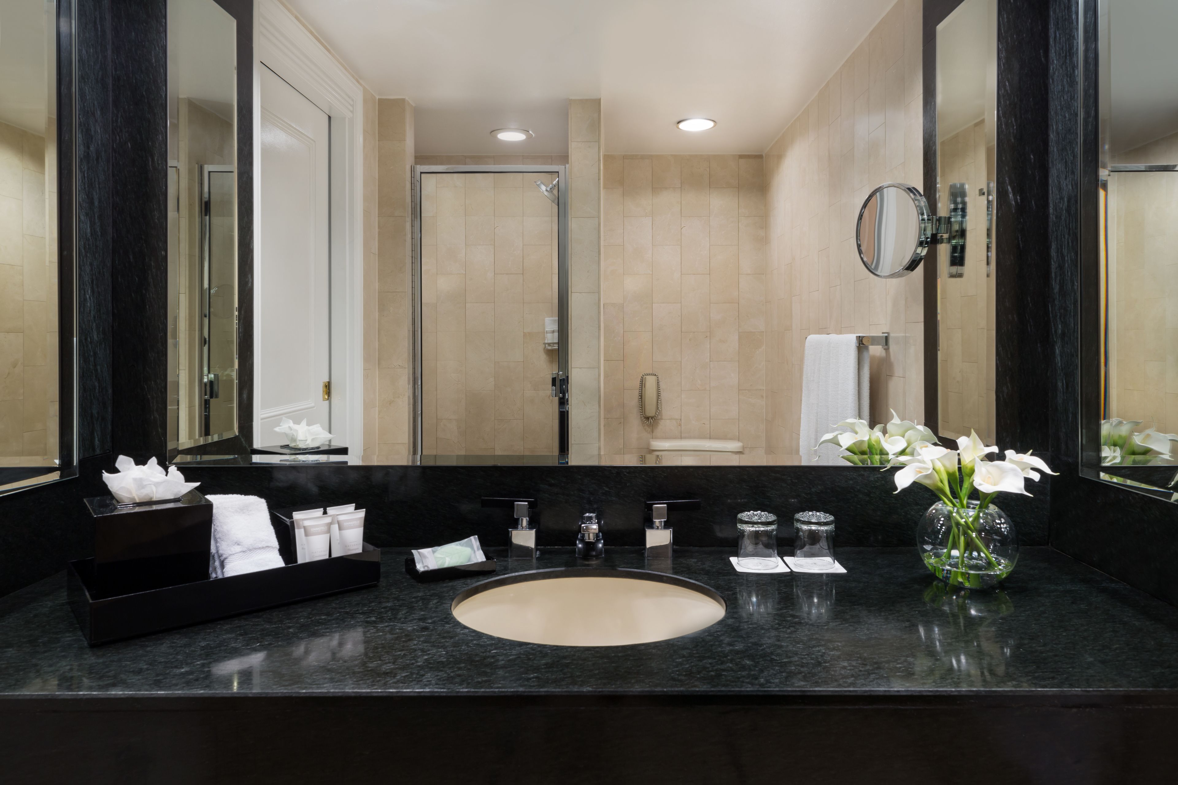 designer toiletries, hair dryer, bathrobes, towels