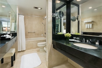 Grand Suite, 1 Bedroom | Bathroom | Designer toiletries, hair dryer, bathrobes, towels at The Michelangelo Hotel