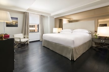 Grand Suite, 1 Bedroom | Premium bedding, minibar, in-room safe, desk at The Michelangelo Hotel