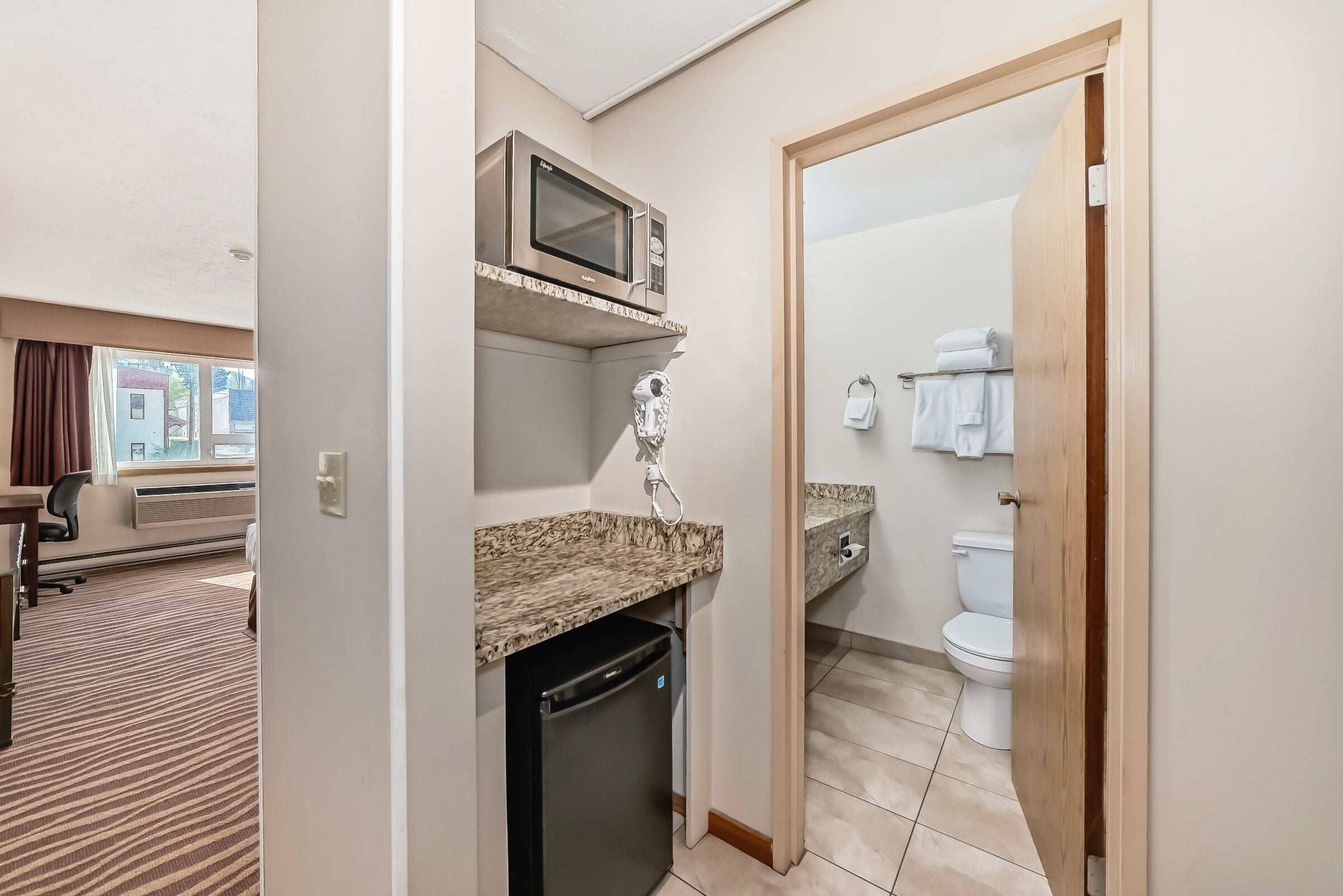 room, 1 king bed, refrigerator & microwave | iron/ironing board, free wifi, bed sheets