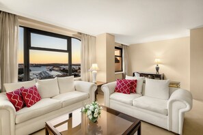Presidential Suite, 1 King Bed | Living area | 38-inch LED TV with digital channels, TV