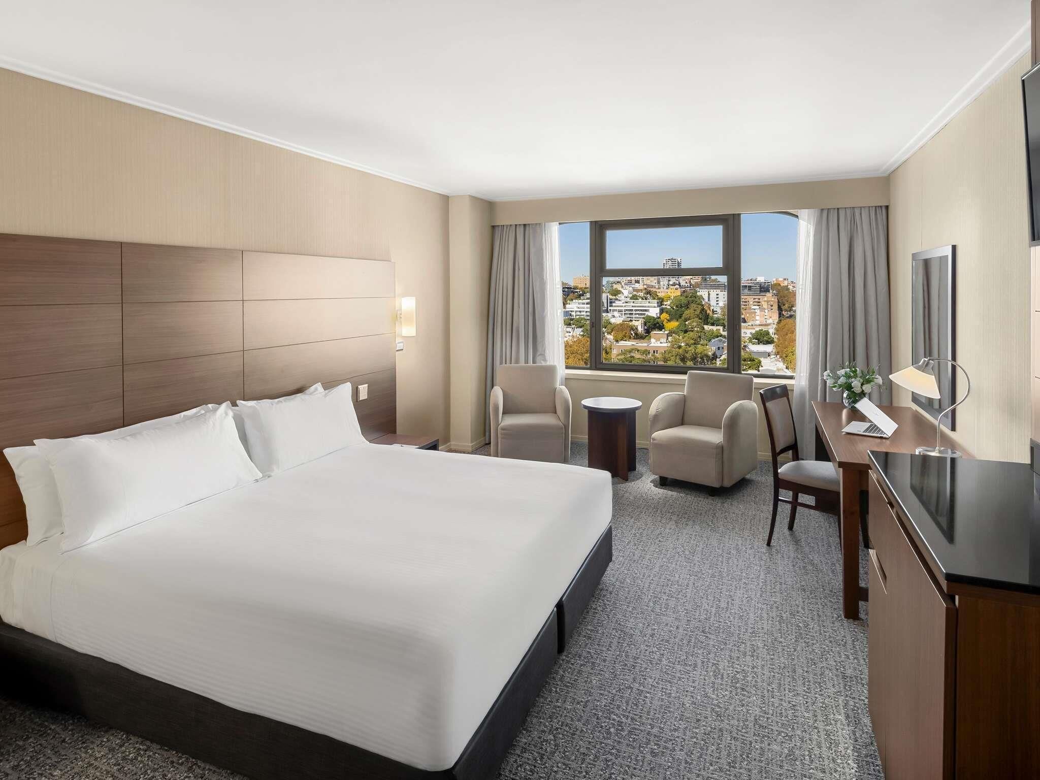 Deluxe Room, 1 King Bed (City Side) | In-room safe, desk, iron/ironing board, free cribs/infant beds