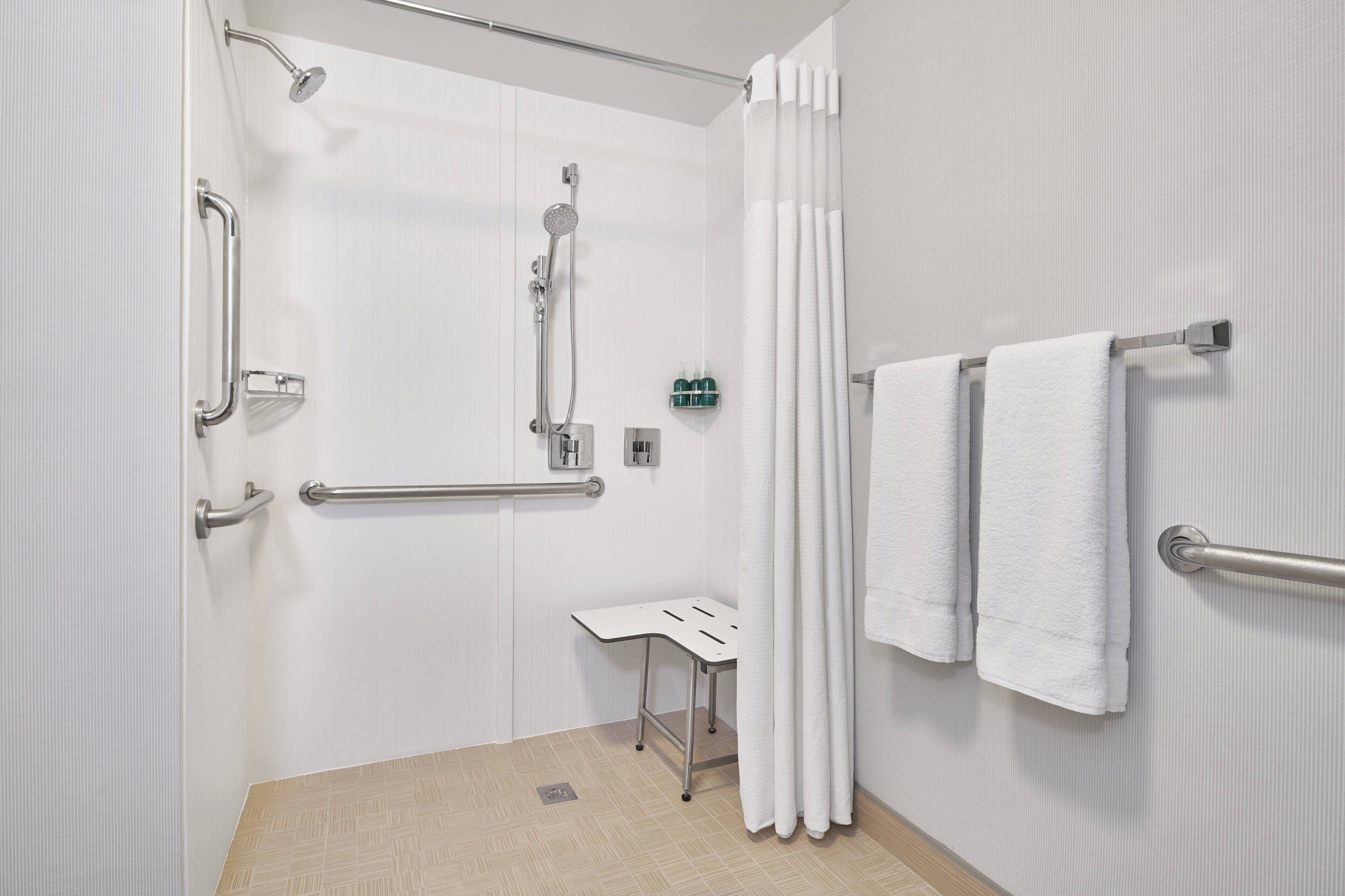 combined shower/bathtub, free toiletries, hair dryer, towels