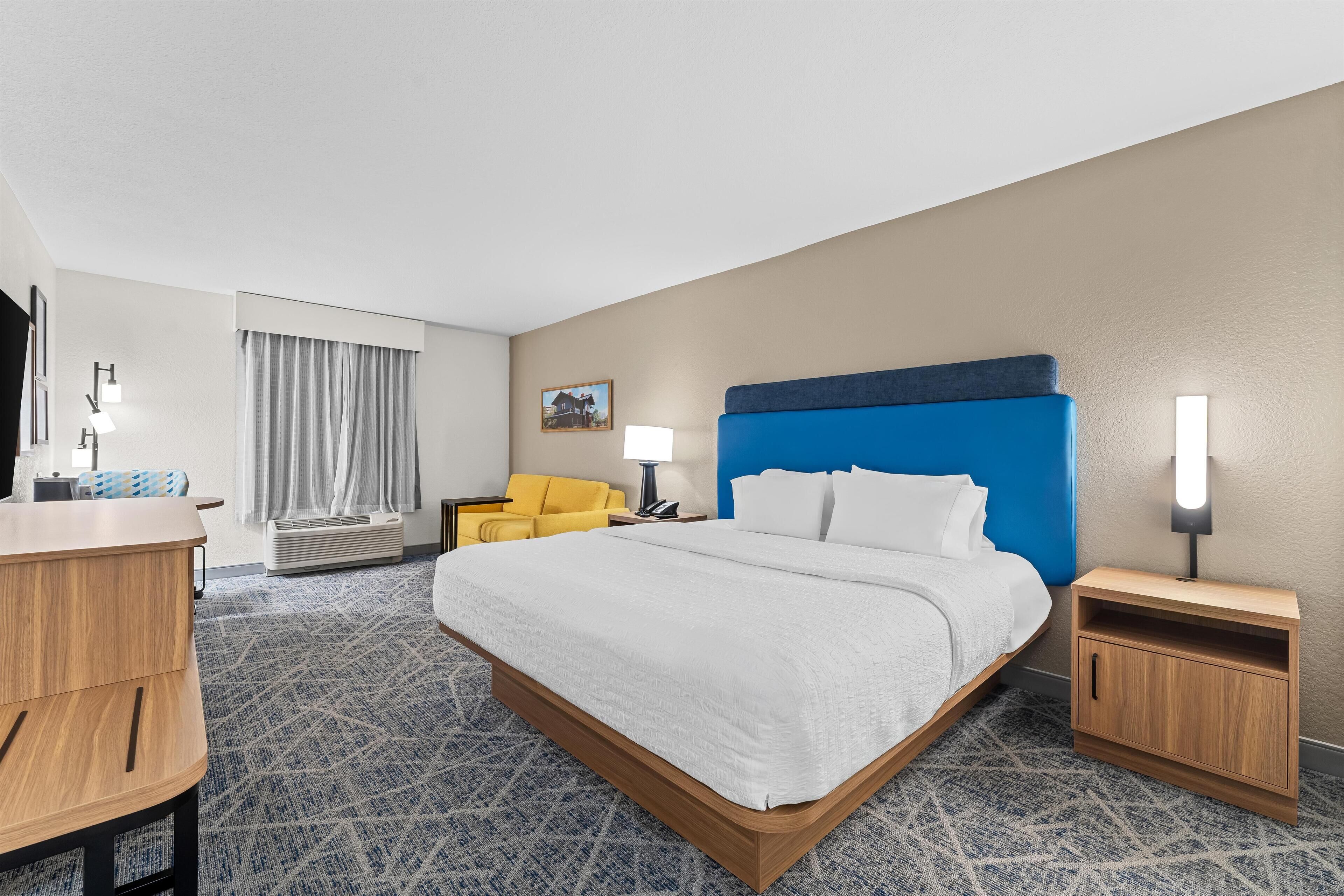 One King and One Sofa Bed | Laptop workspace, blackout curtains, iron/ironing board