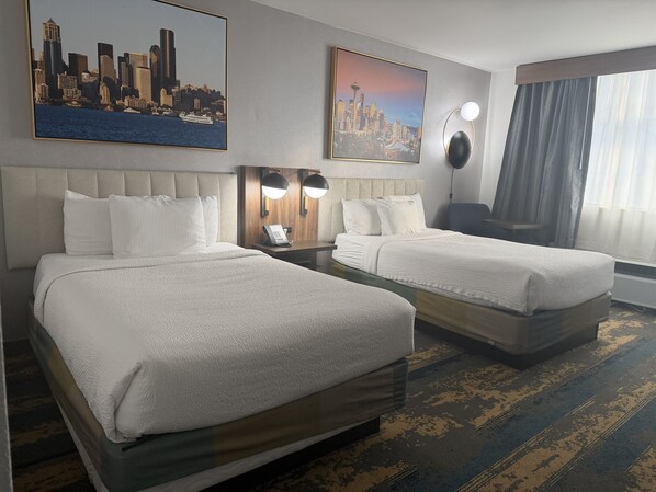 Premium bedding, pillow-top beds, desk, blackout curtains