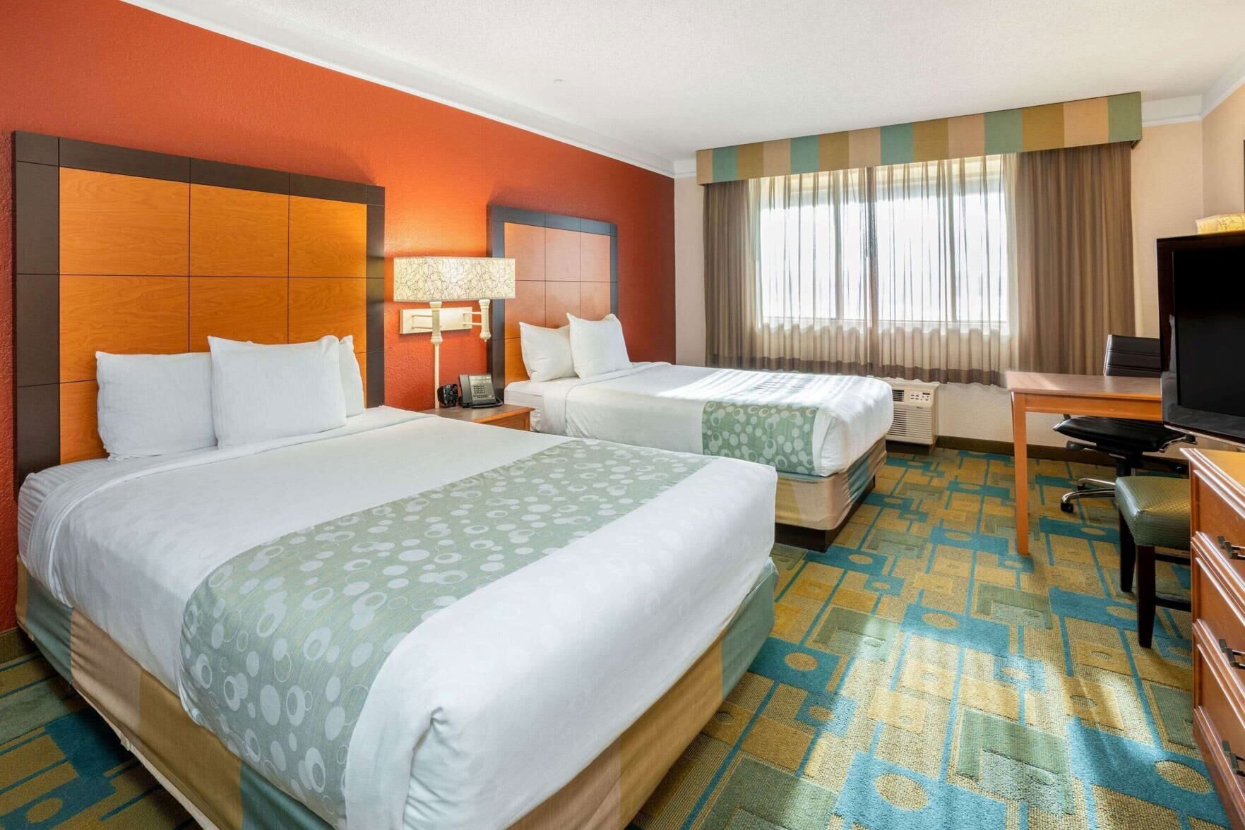 Premium bedding, pillowtop beds, desk, blackout drapes