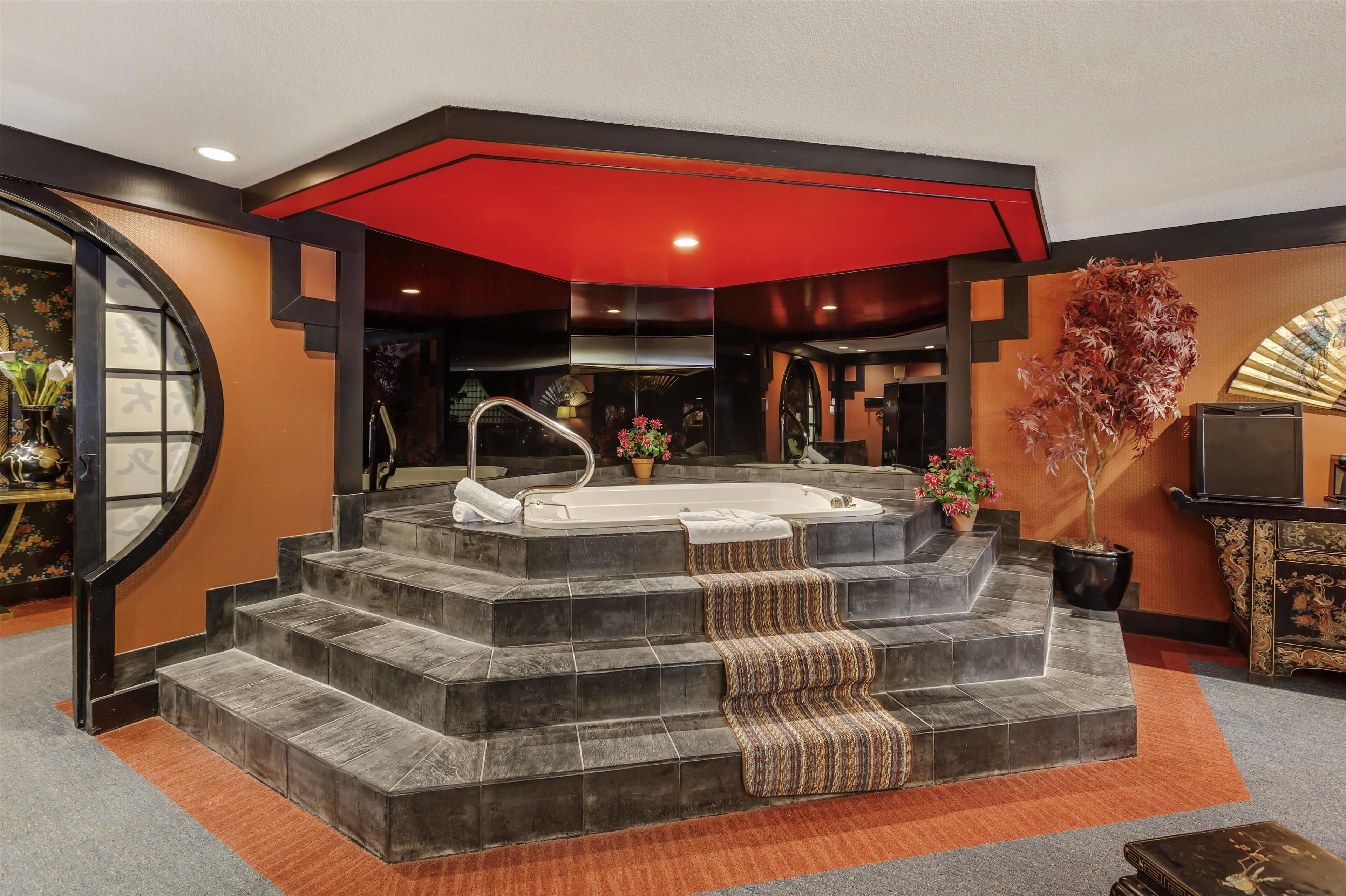 suzie wong suite, 1 queen bed, non smoking, jetted tub | 1 bedroom, premium bedding, pillow-top beds, in-room safe