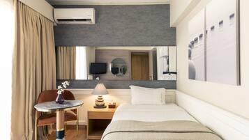 Habitación individual estándar | Ropa de cama de alta calidad, caja fuerte, escritorio