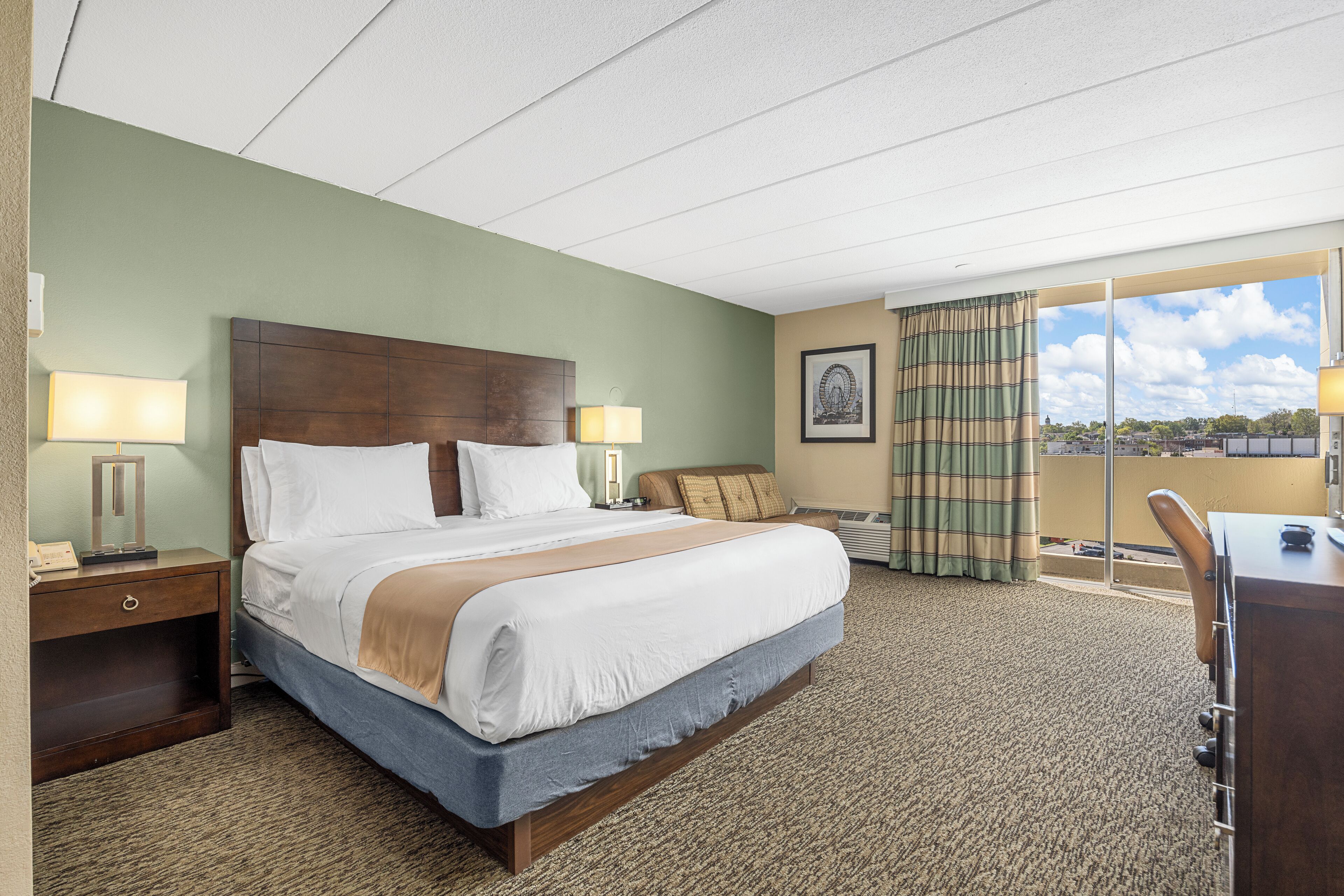 Premium bedding, pillow-top beds, desk, laptop workspace