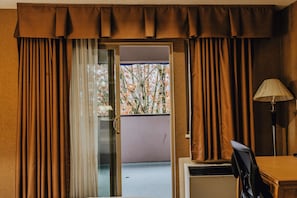 Suite, 1 King Bed, Non Smoking, Balcony | Premium bedding, desk, laptop workspace, blackout curtains