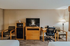 Premium bedding, desk, laptop workspace, blackout curtains