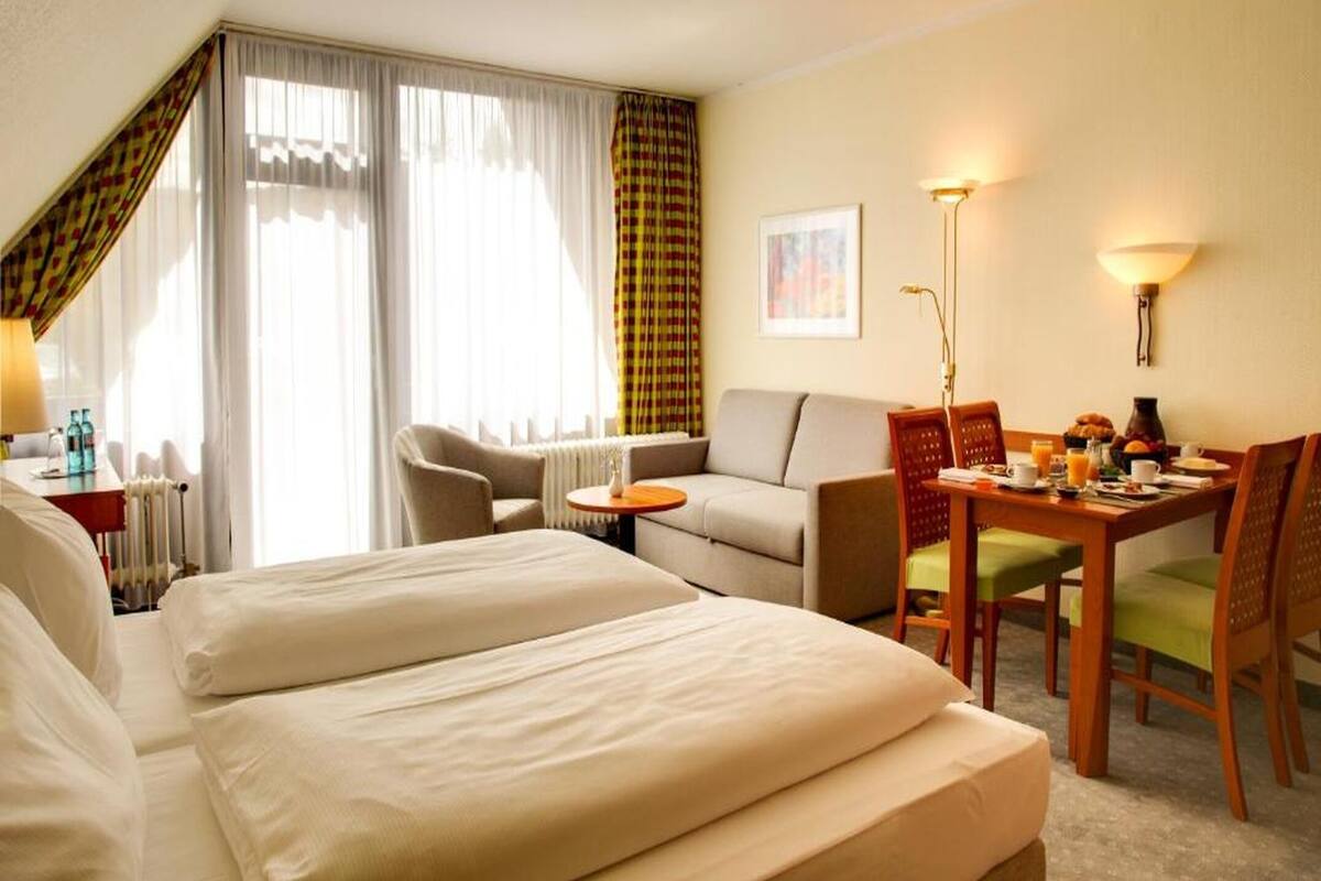 Superior Room | Desk, blackout drapes, iron/ironing board (on request), cribs (free)