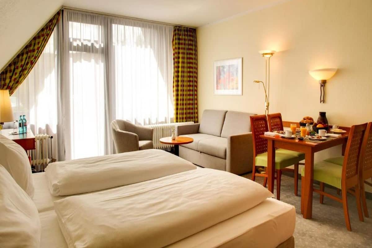 Superior Room | Desk, blackout drapes, iron/ironing board (on request), cribs (free)