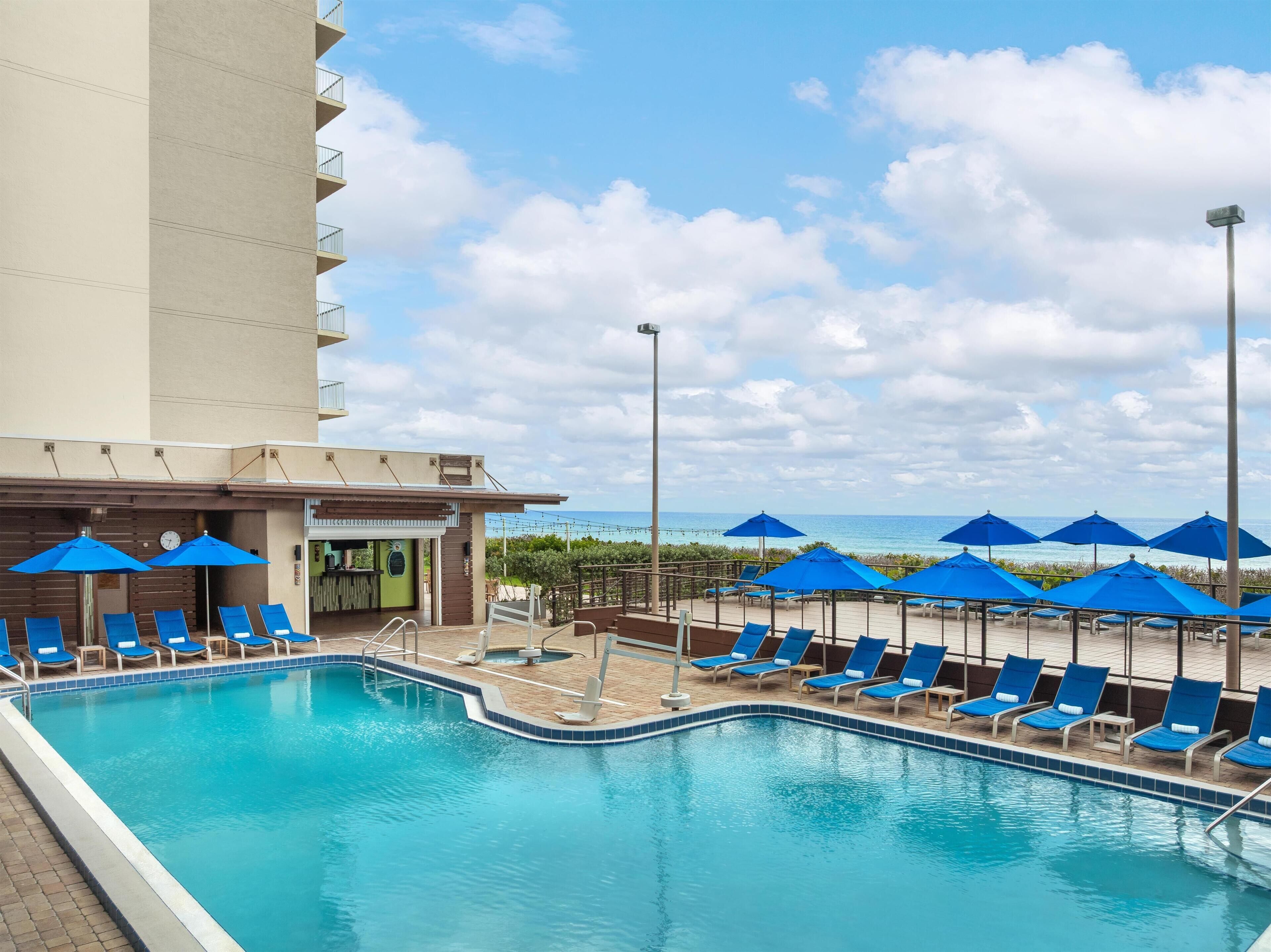 Outdoor pool, open 8 AM to 10 PM, pool umbrellas, sun loungers