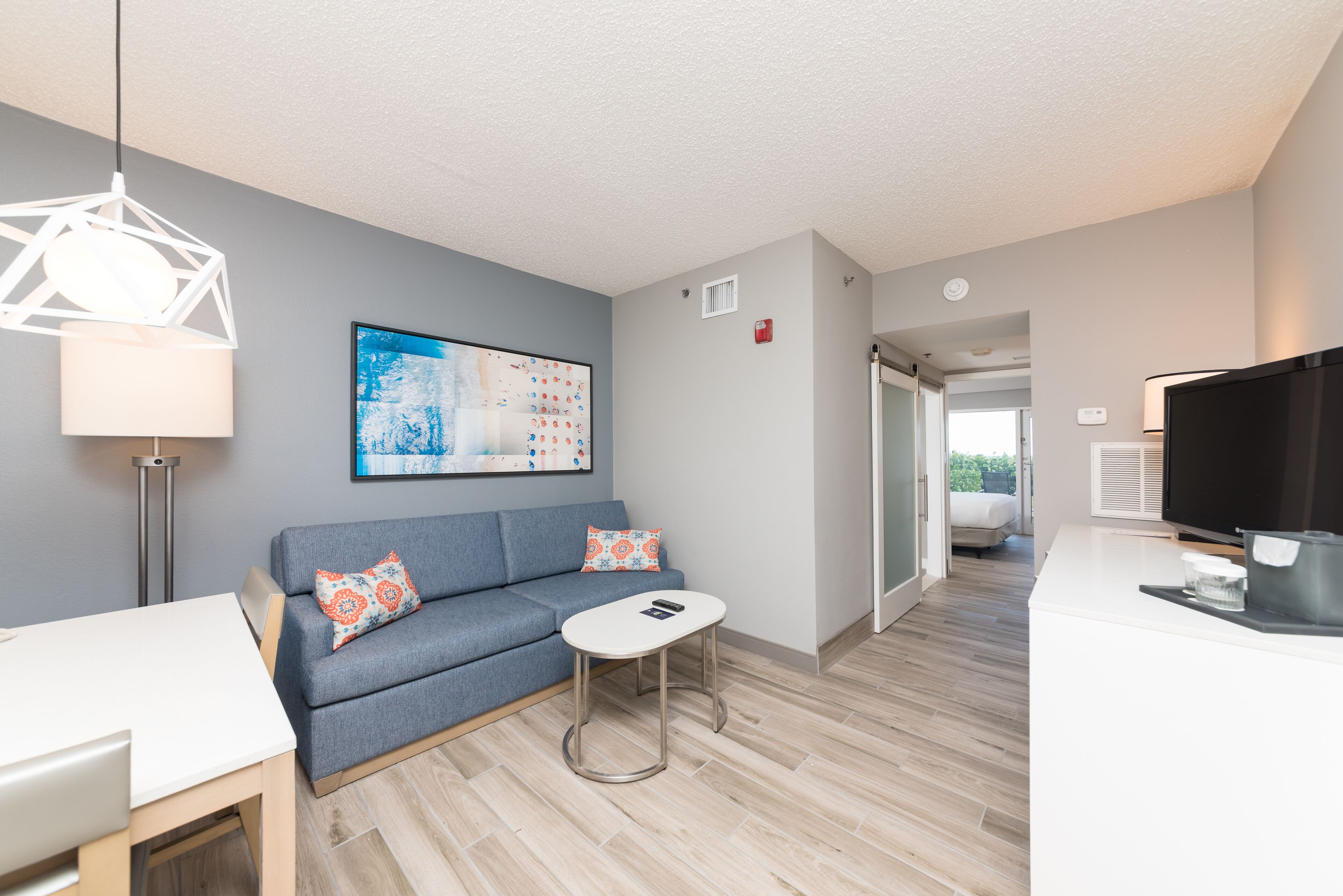 suite, 1 queen bed, accessible, patio (roll-in shower) | living area | 37-inch flat-screen tv with cable channels, tv, pay films