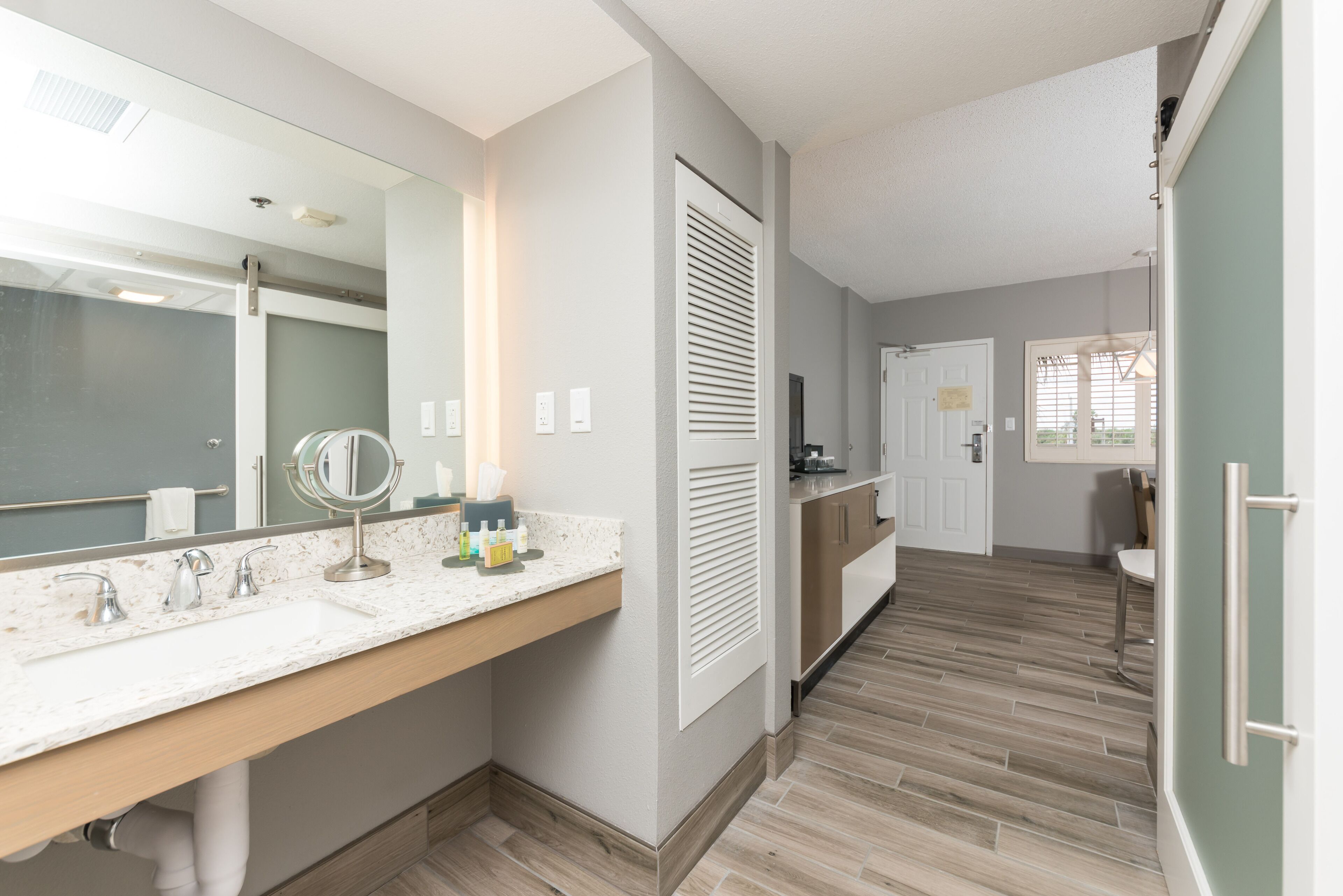 hydromassage showerhead, designer toiletries, hair dryer, towels