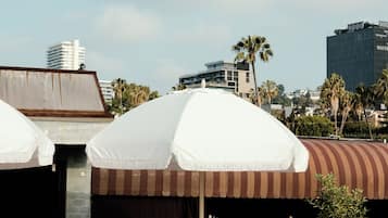 Outdoor pool, pool umbrellas, sun loungers