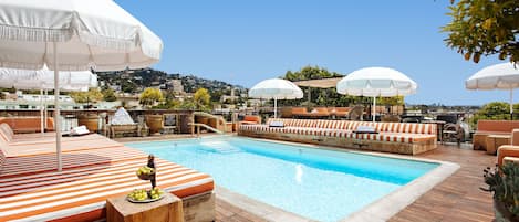 Outdoor pool, pool umbrellas, pool loungers