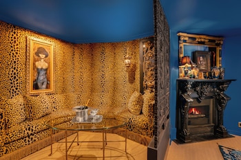 Grand Belle Bleue | Living area | Flat-screen TV, fireplace, iPod dock at Petit Ermitage