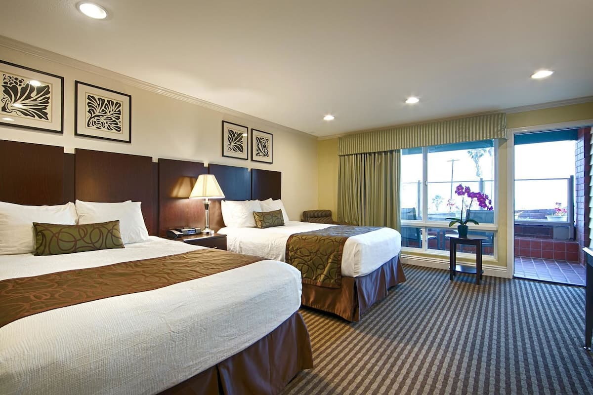 Luxe beddengoed, pillowtop-bedden, een kluis op de kamer