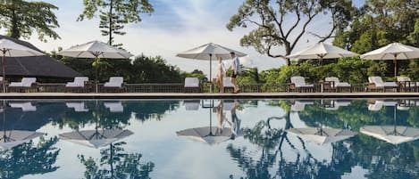 2 outdoor pools, pool umbrellas, pool loungers