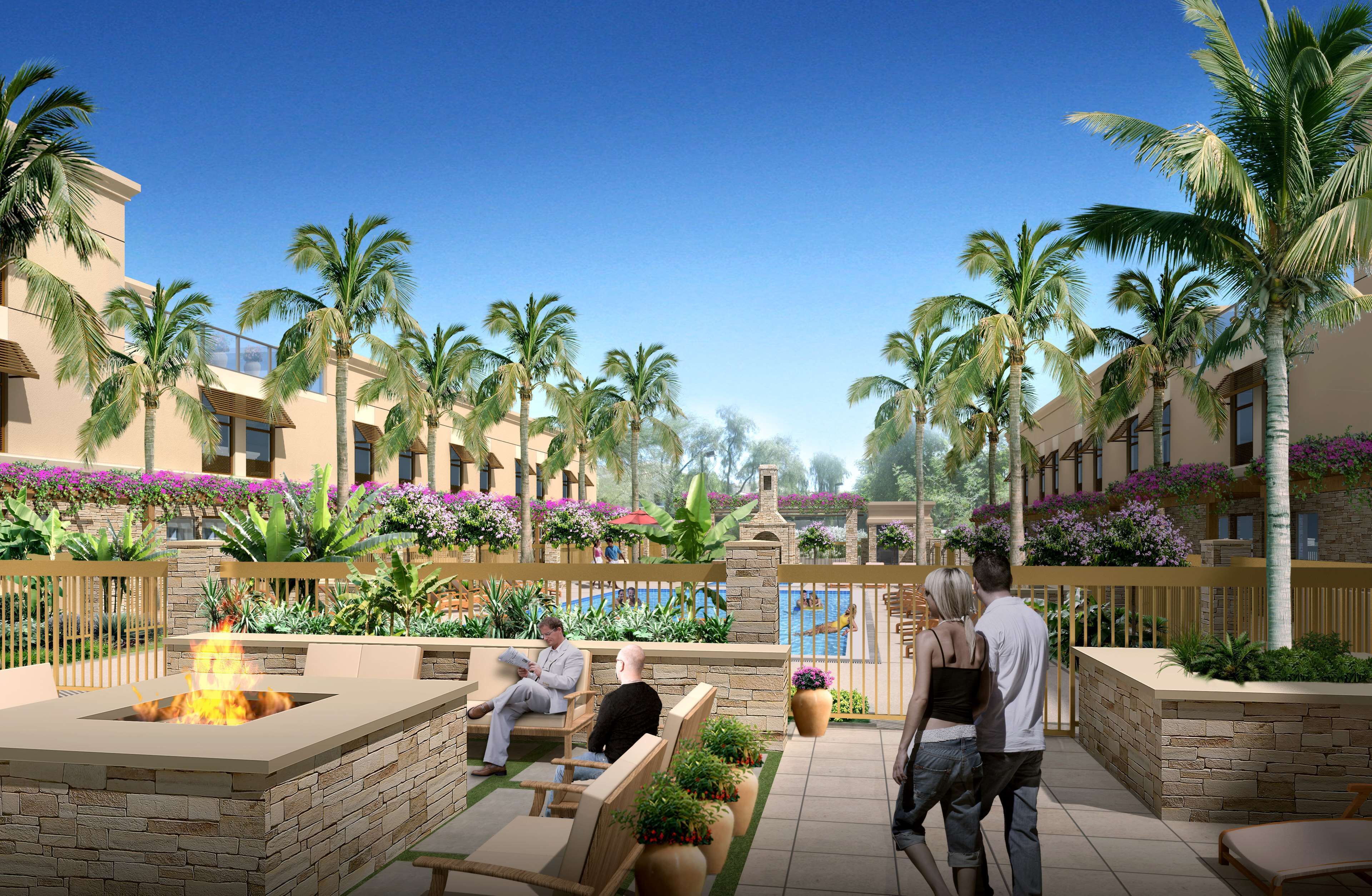 Una piscina al aire libre, sombrillas