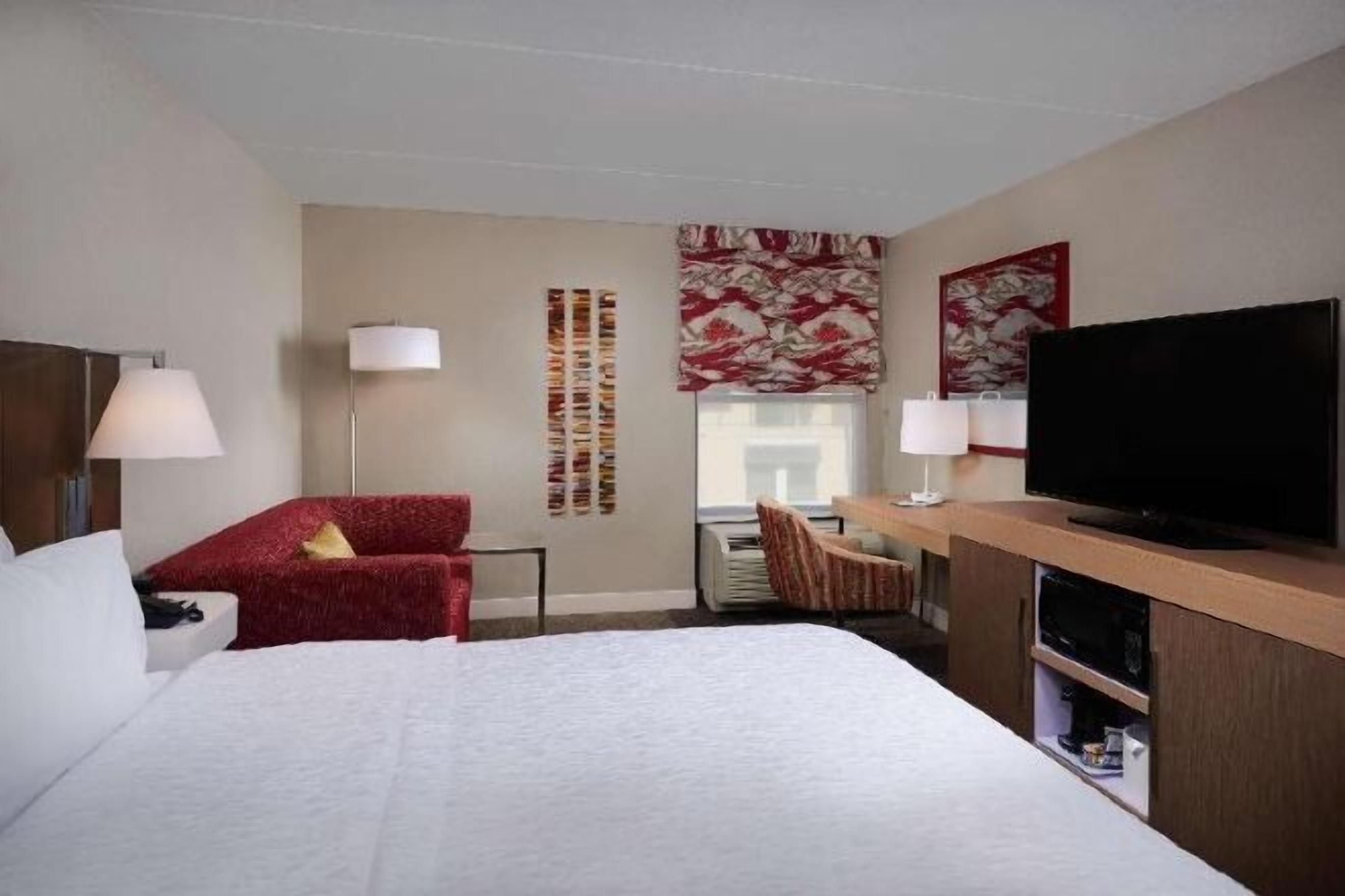 Blackout drapes, iron/ironing board, free cribs/infant beds