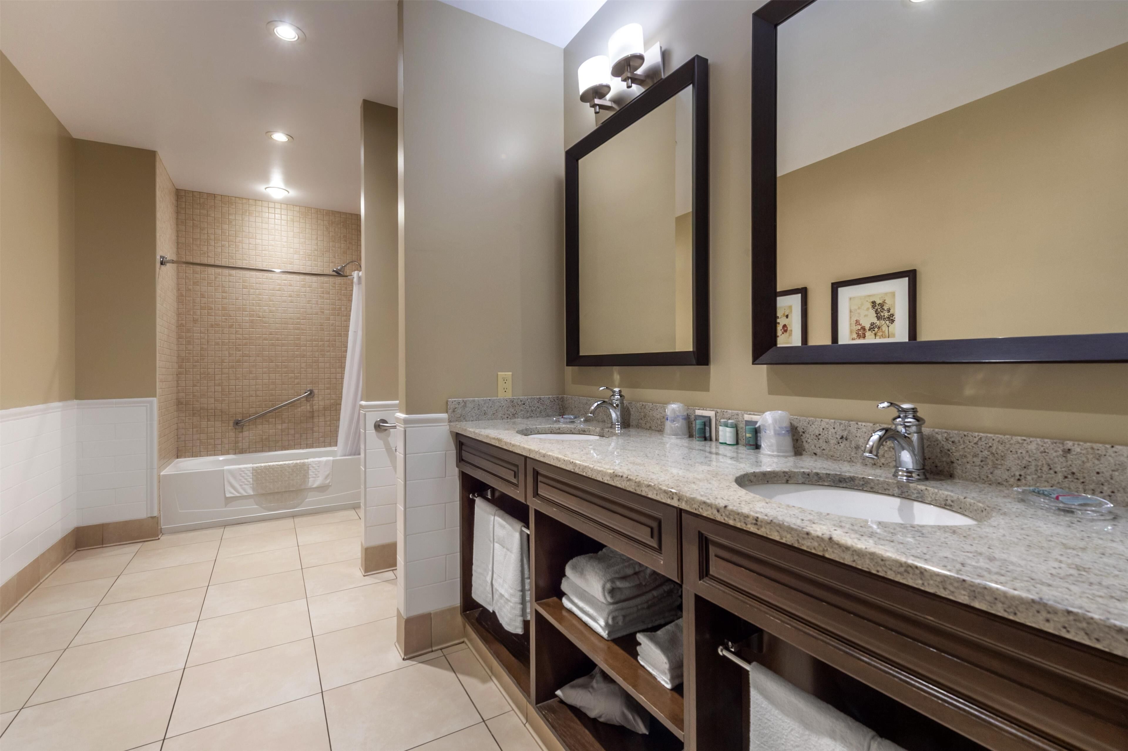 suite, 1 king bed, non smoking, fireplace | bathroom | free toiletries, hair dryer, towels, soap