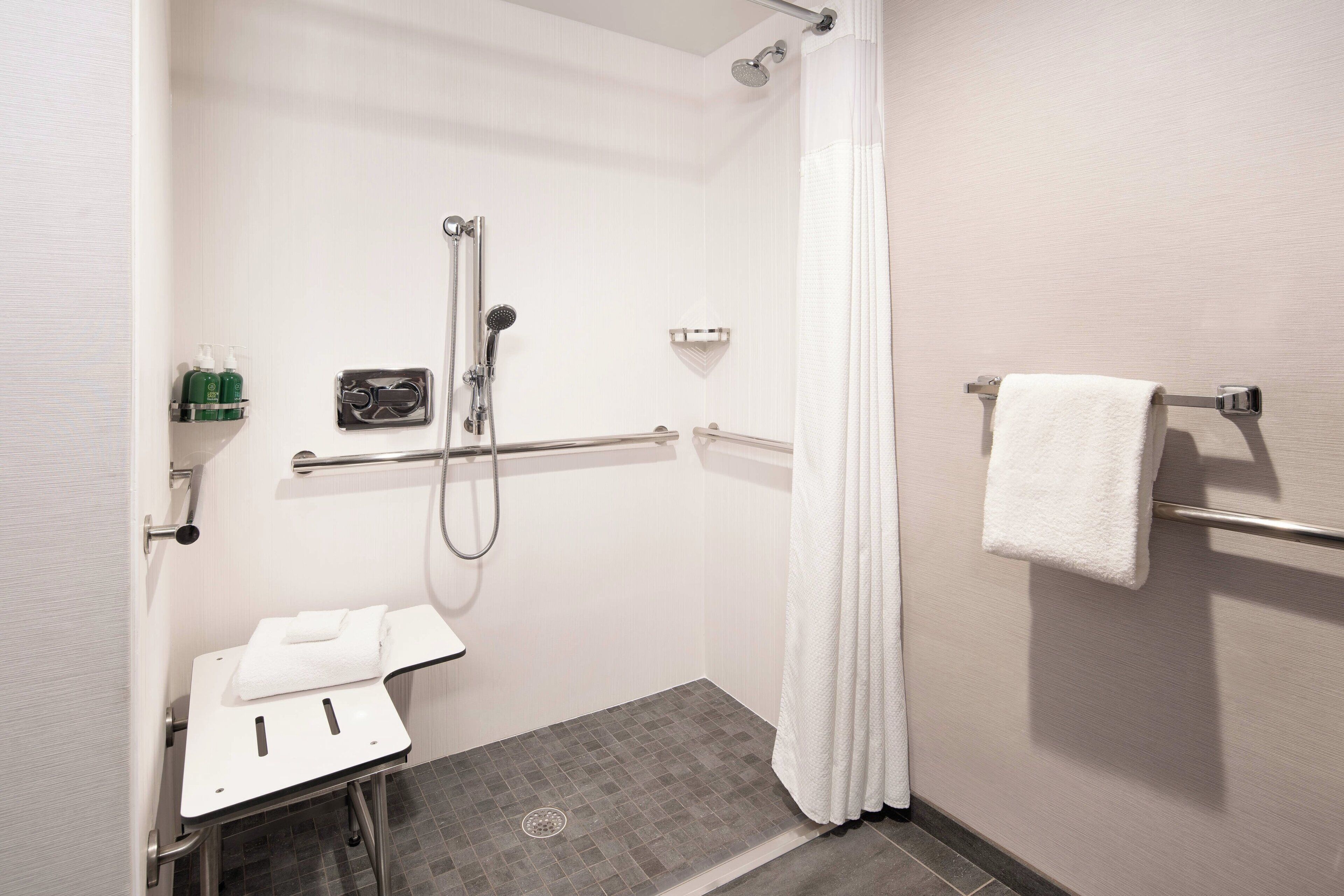 combined shower/bathtub, free toiletries, hair dryer, towels