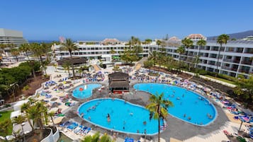 2 outdoor pools, open 10:00 AM to 6:00 PM, pool umbrellas, pool loungers